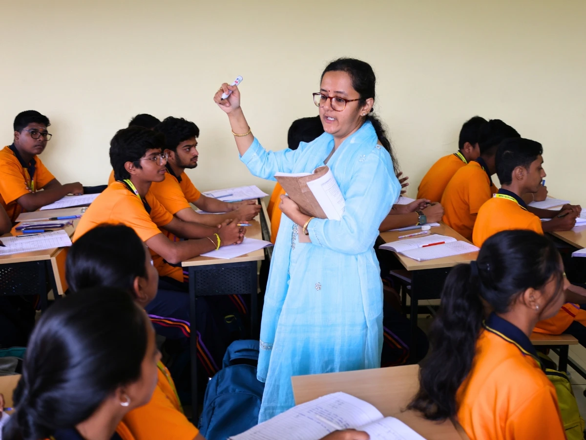 Graduate student celebrating academic achievement at NewAge PU College
